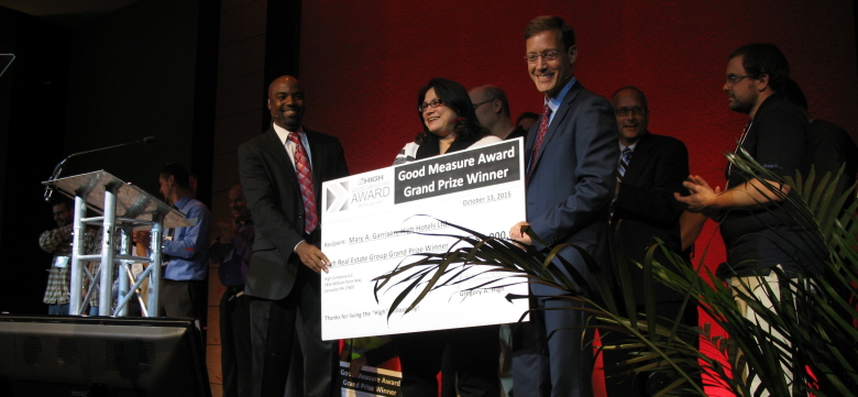 Greg High and Darryl Gordon present the grand prize award during the 2016 High Forum.